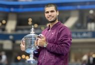 Carlos Alcaraz with the 2025 US Open trophy (Getty)